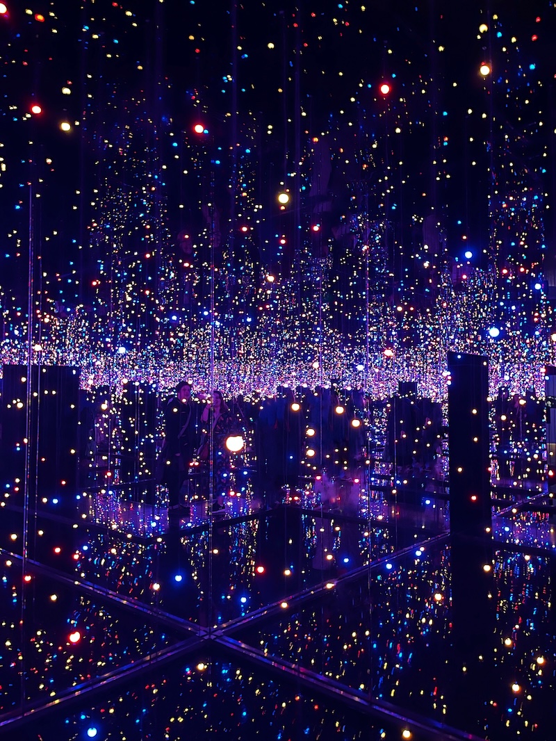 Jo and Alex in the Yayoi Kusama exhibition, where we got engaged